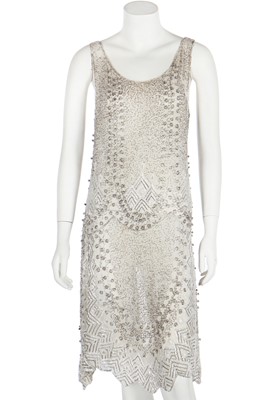 Lot 51 - A beaded white muslin flapper dress, circa 1928