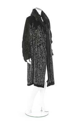Lot 125 - A Liberty of London black velvet opera coat,...