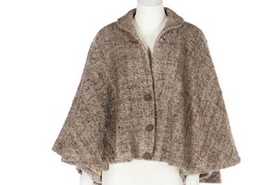 Lot 118 - A Pierre Cardin flared boucle wool jacket, probably late 1960s