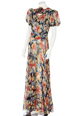 Lot 65 - A good floral printed chiffon garden party gown, 1930s