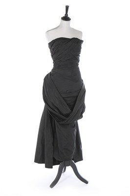 Lot 136 - A Balenciaga couture black silk taffeta...