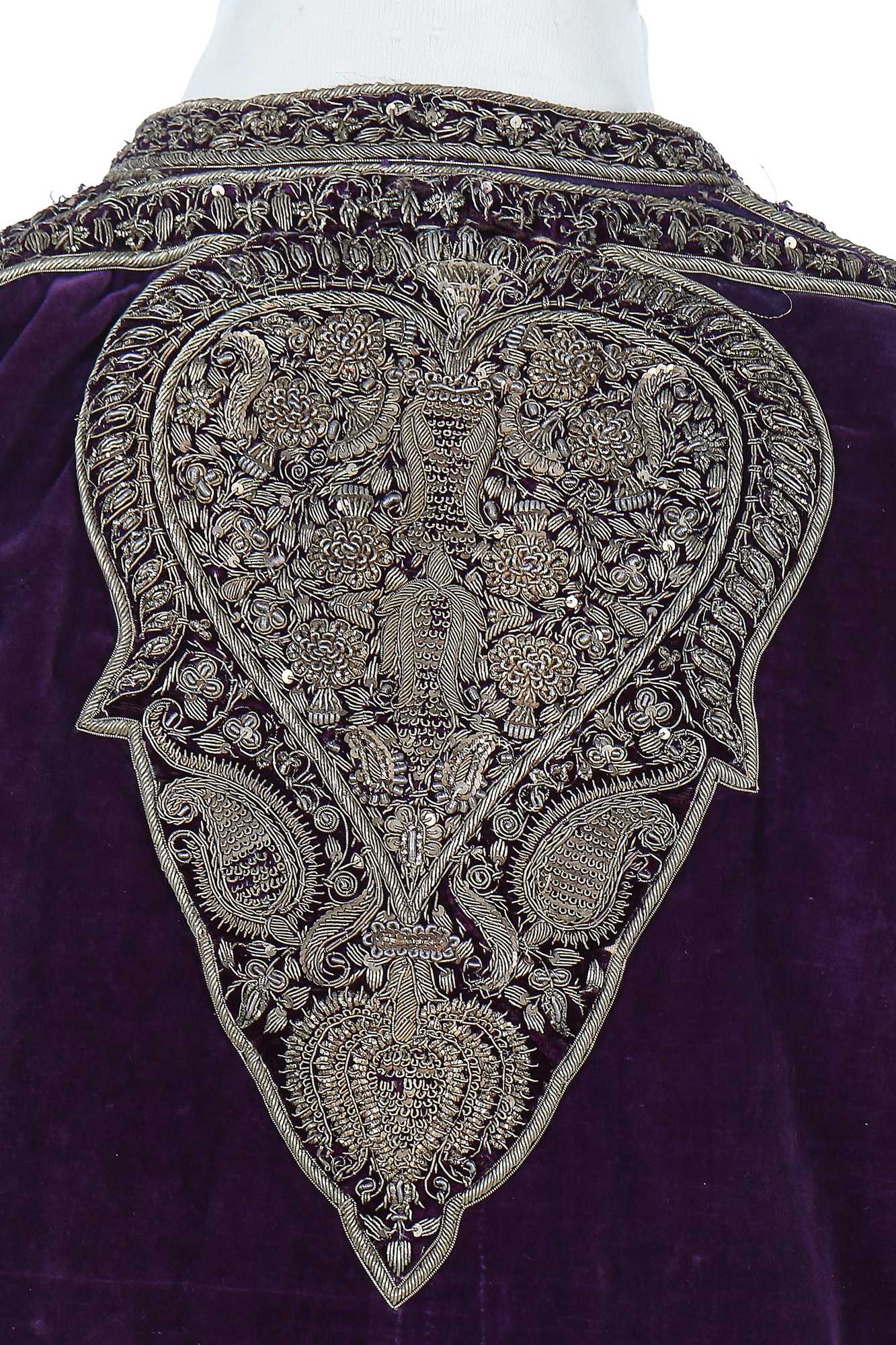 Lot 256 - A men's purple velvet angarkha jacket, Indian, circa 1900