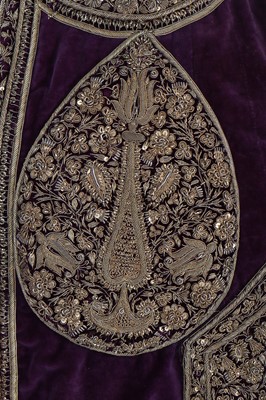 Lot 256 - A men's purple velvet angarkha jacket, Indian, circa 1900