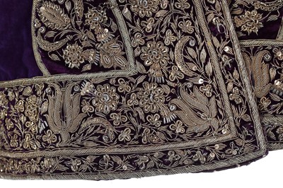 Lot 256 - A men's purple velvet angarkha jacket, Indian, circa 1900