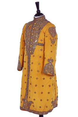 Lot 258 - A young men's brilliant yellow silk court coat, Indian, 1910-20