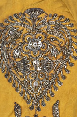 Lot 258 - A young men's brilliant yellow silk court coat, Indian, 1910-20