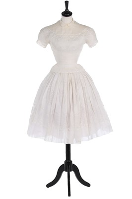 Lot 142 - A Carven couture embroidered and beaded white...