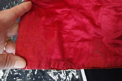 Lot 257 - A boys' embroidered scarlet velvet court coat, Indian, late 19th century