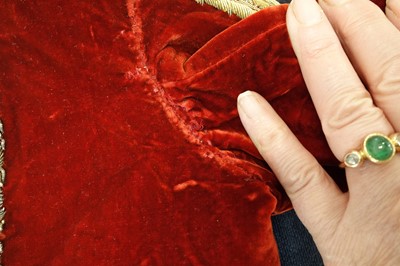 Lot 257 - A boys' embroidered scarlet velvet court coat, Indian, late 19th century