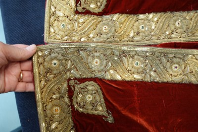 Lot 257 - A boys' embroidered scarlet velvet court coat, Indian, late 19th century