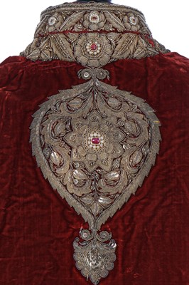 Lot 257 - A boys' embroidered scarlet velvet court coat, Indian, late 19th century