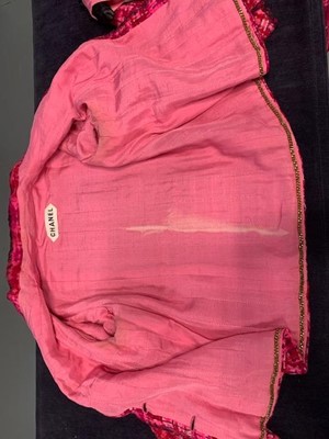 Lot 8 - A Chanel couture shocking-pink tweed suit, Spring-Summer 1966