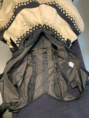 Lot 80 - An Emilio Schuberth couture black satin evening gown, mid 1950s