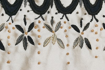 Lot 80 - An Emilio Schuberth couture black satin evening gown, mid 1950s