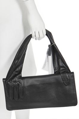 Lot 58 - A group of Maison Margiela for H&M accessories, 2012