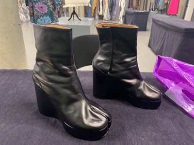 Lot 239 - A pair of Martin Margiela black leather boots with chrome metal heels, 2000s