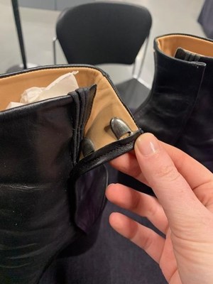 Lot 239 - A pair of Martin Margiela black leather boots with chrome metal heels, 2000s