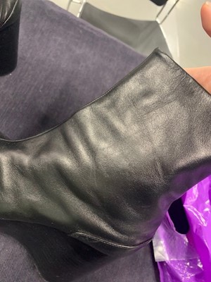 Lot 239 - A pair of Martin Margiela black leather boots with chrome metal heels, 2000s