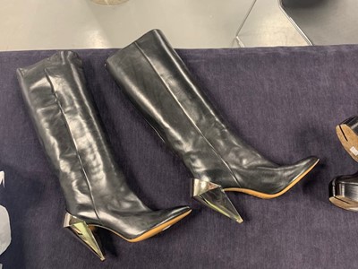 Lot 239 - A pair of Martin Margiela black leather boots with chrome metal heels, 2000s
