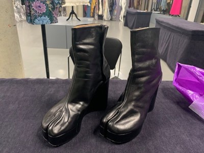 Lot 239 - A pair of Martin Margiela black leather boots with chrome metal heels, 2000s