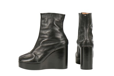Lot 239 - A pair of Martin Margiela black leather boots with chrome metal heels, 2000s
