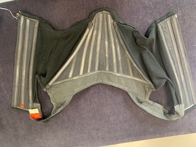 Lot 111 - A Vivienne Westwood black velvet corset, late 1980s-early 1990s