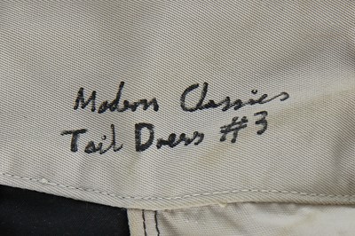 Lot 151 - An early Willie Brown black cotton 'Tail Dress', 1979