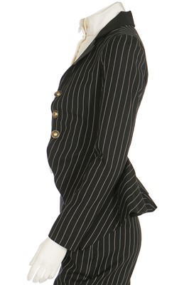 Lot 249 - A Christian Dior by John Galliano couture striped wool trouser ensemble, 'Equestrienne/Charles James' collection, Spring-Summer 2010