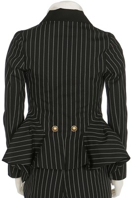 Lot 249 - A Christian Dior by John Galliano couture striped wool trouser ensemble, 'Equestrienne/Charles James' collection, Spring-Summer 2010