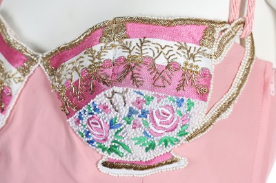 Lot 130 - A Moschino pink rayon-blend dress with embellished 'tea cups' to bust, circa 1991