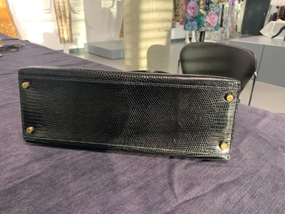 Lot 63 - An Hermès black niloticus lizard Kelly 32, 1989