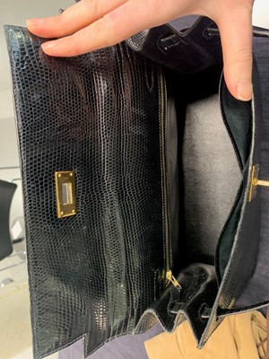 Lot 63 - An Hermès black niloticus lizard Kelly 32, 1989