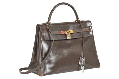Lot 34 - An Hermès brown box leather Kelly 32, 1970