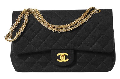 Lot 4 - A Chanel black quilted wool-jersey flap bag, 1989-91