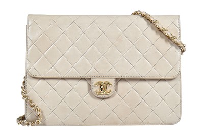 Lot 11 - A Chanel sand-coloured quilted lambskin leather bag, 1980s