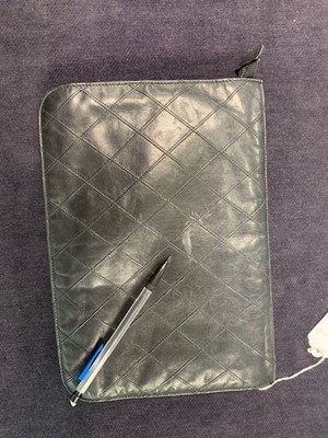 Lot 13 - A Chanel quilted black lambskin leather pochette, 1986-88
