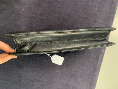 Lot 13 - A Chanel quilted black lambskin leather pochette, 1986-88