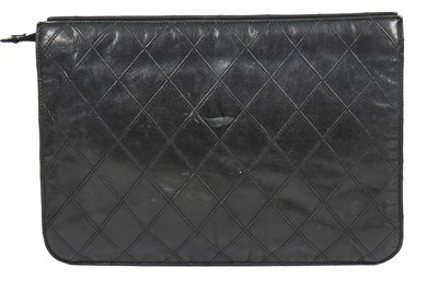 Lot 13 - A Chanel quilted black lambskin leather pochette, 1986-88