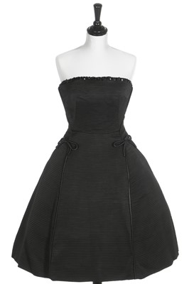 Lot 82 - A Christian Dior London black ottoman satin cocktail dress, model 'Sonnet', Spring-Summer, 1953