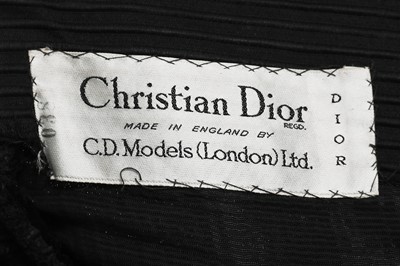 Lot 82 - A Christian Dior London black ottoman satin cocktail dress, model 'Sonnet', Spring-Summer, 1953