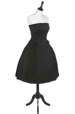 Lot 82 - A Christian Dior London black ottoman satin cocktail dress, model 'Sonnet', Spring-Summer, 1953