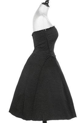 Lot 82 - A Christian Dior London black ottoman satin cocktail dress, model 'Sonnet', Spring-Summer, 1953