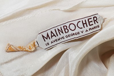 Lot 68 - A Mainbocher couture ivory satin court presentation gown, early 1930s