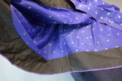 Lot 240 - A gown of aniline-dyed purple silk damask,  early 1870s
