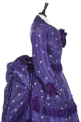 Lot 240 - A gown of aniline-dyed purple silk damask,  early 1870s