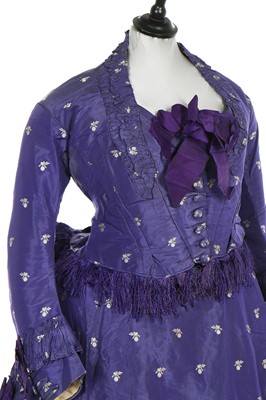 Lot 240 - A gown of aniline-dyed purple silk damask,  early 1870s