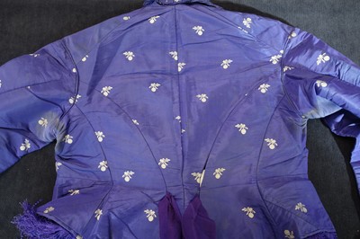 Lot 240 - A gown of aniline-dyed purple silk damask,  early 1870s