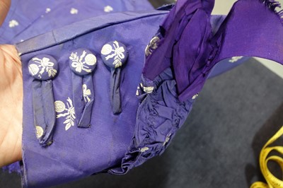 Lot 240 - A gown of aniline-dyed purple silk damask,  early 1870s