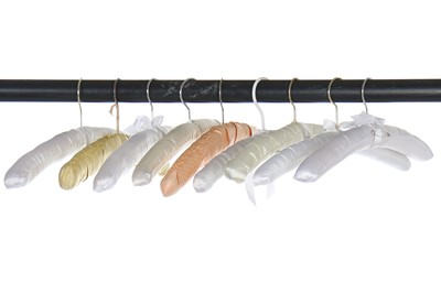 Lot 182A - A large bag of mainly ivory-coloured padded hangers