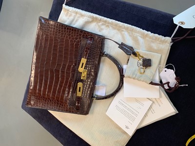 Lot 65 - An Hermès brown crocodile Kelly bag, late 1960s